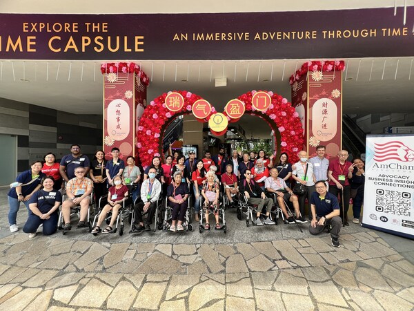 AmChamSG volunteers with St Luke's ElderCare Elders at the Singapore Flyer